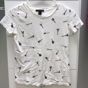 White tee with guitars